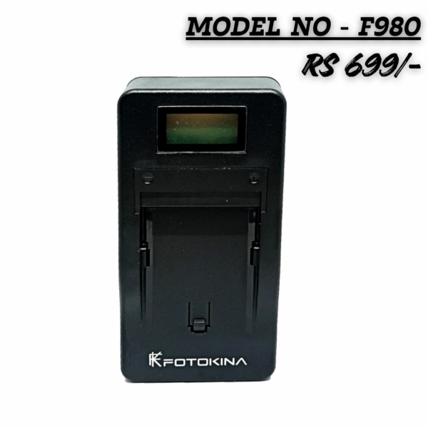 Black FOTOKINA NP-F980 series battery charger with an LCD display slot, compatible with Sony F-series batteries, marked with a price of 'RS 699/-'.