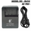 A black FOTOKINA BLC12 Digital Camera Battery Charger, designed for BLC12 batteries, shown next to its black AC power cable with a 2-pin European/Indian plug. The text overlays read "MODEL NO - BLC12" and "RS 799/-".