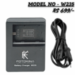 FOTOKINA Battery Charger W235 for NP-W235 style digital camera batteries, shown with detachable AC power cable. Price $699/-$.